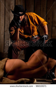 stock-photo-cowboy-with-naked-bondwoman-against-wooden-background-96019571